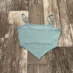 Turquoise triangle shaped crop top.